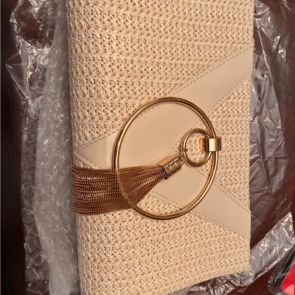 Elegant Cream Clutch with Gold Accent